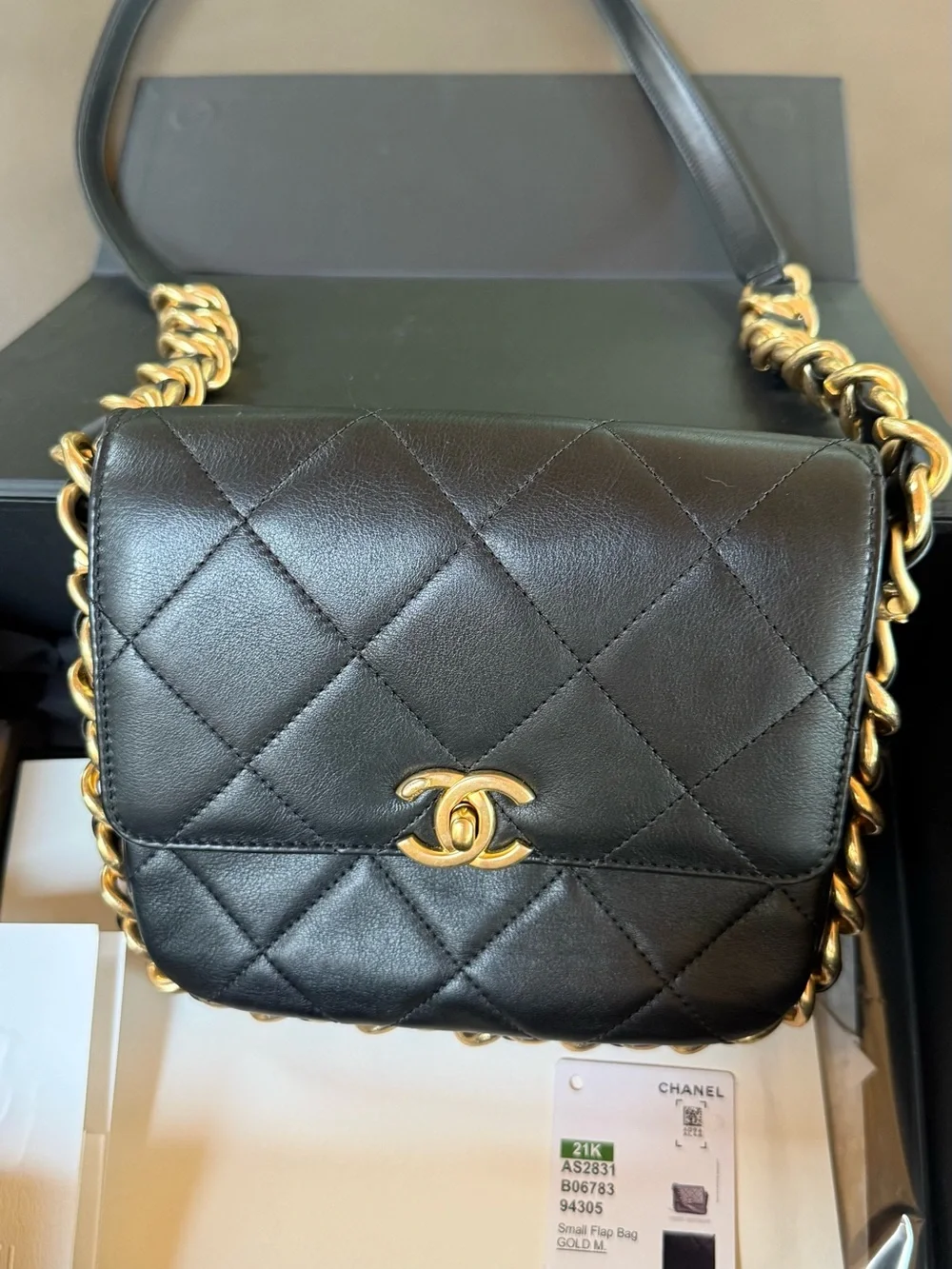 CHANEL Black Quilted Leather Mini Crossbody with Gold Hardware